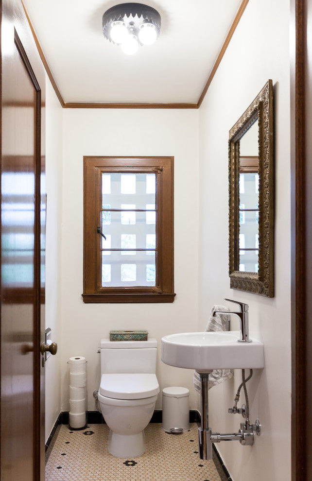 Design ideas for a mediterranean cloakroom in Sacramento with a one-piece toilet, white walls, mosaic tile flooring, a wall-mounted sink and beige floors.