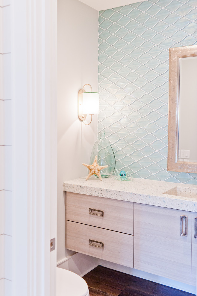 Design ideas for a medium sized coastal cloakroom in Jacksonville with flat-panel cabinets, light wood cabinets, blue tiles, glass tiles, an integrated sink and terrazzo worktops.