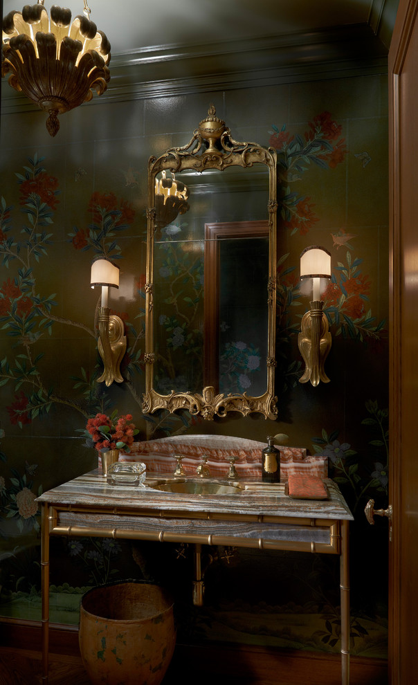 This is an example of a small classic cloakroom in Chicago with marble worktops, green walls and a console sink.