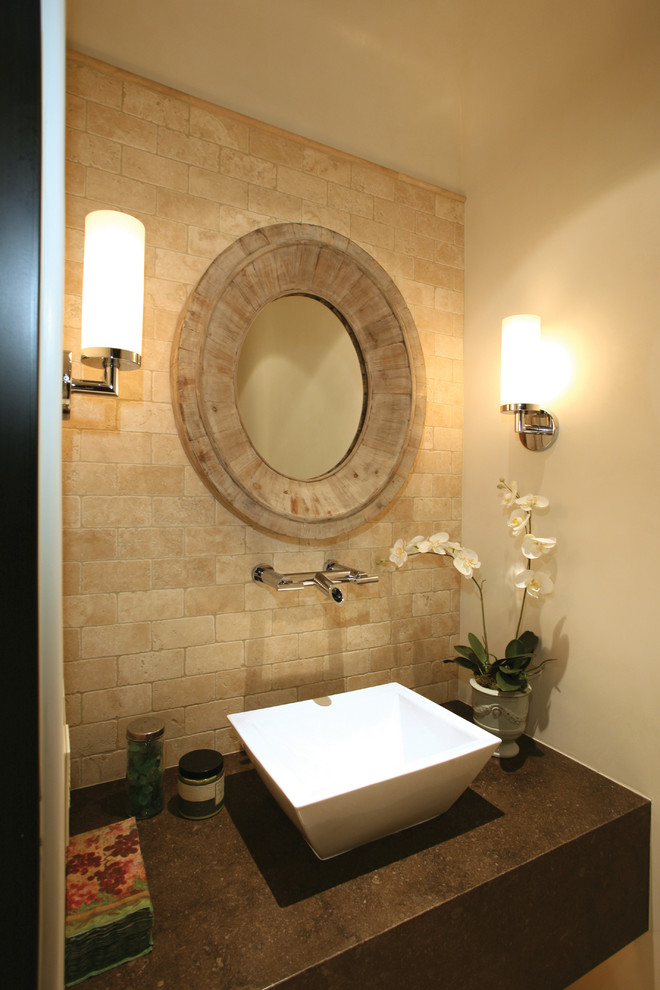 Example of a tuscan powder room design in Orange County