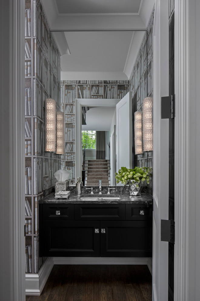 Classic cloakroom in Detroit with flat-panel cabinets, black cabinets and dark hardwood flooring.