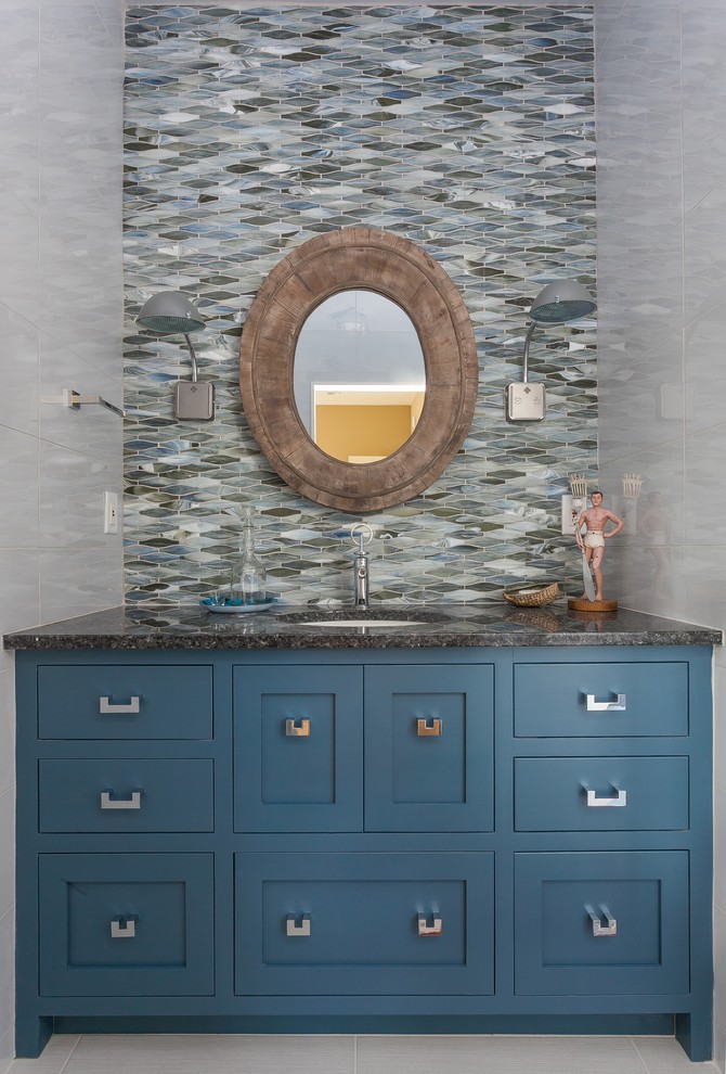 Example of a transitional powder room design in Charleston with shaker cabinets, blue cabinets, an undermount sink and gray countertops