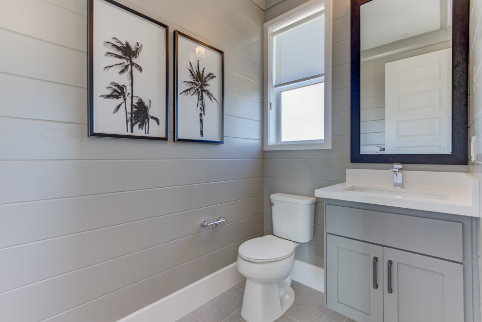 Inspiration for a powder room remodel in San Francisco with a two-piece toilet, an undermount sink and a built-in vanity