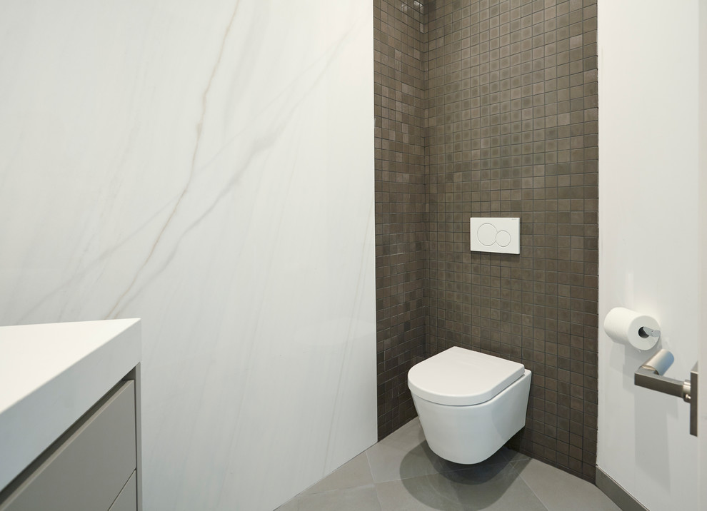 Design ideas for a medium sized modern cloakroom in San Francisco with flat-panel cabinets.