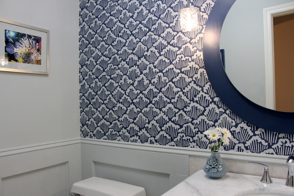 Design ideas for a small contemporary cloakroom in Toronto with blue walls.