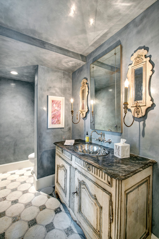 Inspiration for a french country powder room remodel in Houston