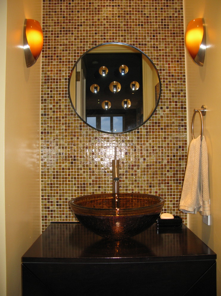 Inspiration for a small transitional multicolored tile and mosaic tile powder room remodel in San Francisco with a vessel sink, black cabinets, flat-panel cabinets, yellow walls and quartz countertops