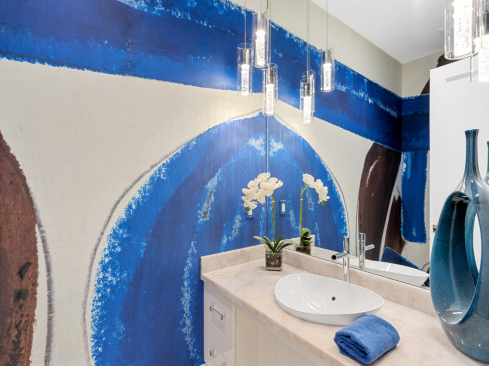 Mid-sized trendy porcelain tile and wallpaper powder room photo in Miami with a drop-in sink and a floating vanity