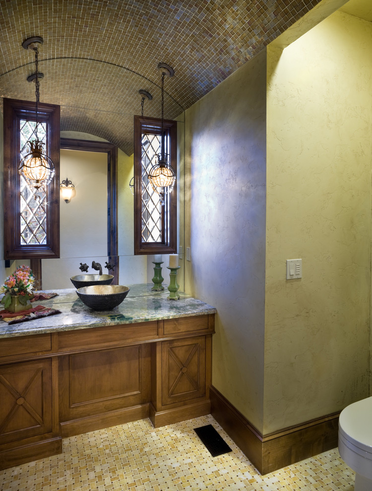 Example of a classic powder room design in Portland with a vessel sink, granite countertops and green countertops