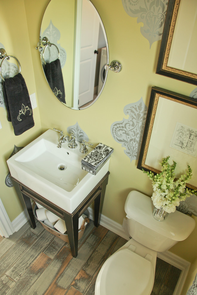 Example of an eclectic powder room design in Louisville