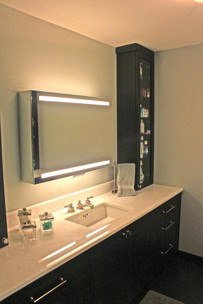 Design ideas for a medium sized contemporary cloakroom in New York with recessed-panel cabinets.
