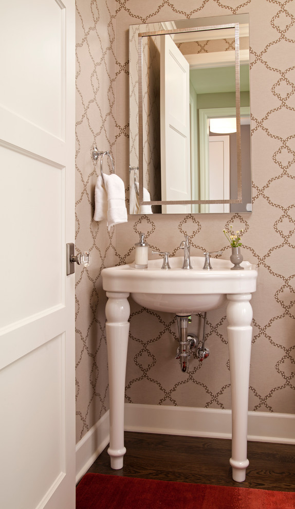 Inspiration for a traditional cloakroom in Minneapolis with a console sink.
