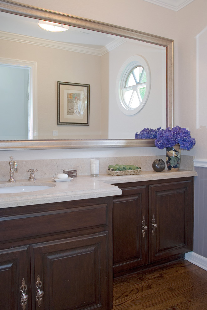 Inspiration for a timeless powder room remodel in Los Angeles with an undermount sink