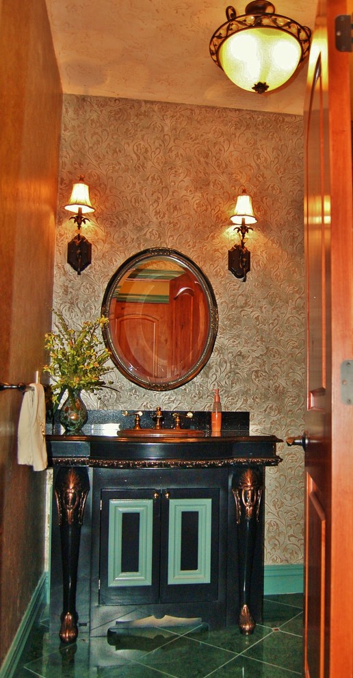Photo of a small traditional cloakroom in Other with raised-panel cabinets, black cabinets, a two-piece toilet, multi-coloured walls, marble flooring, a built-in sink, engineered stone worktops and green tiles.