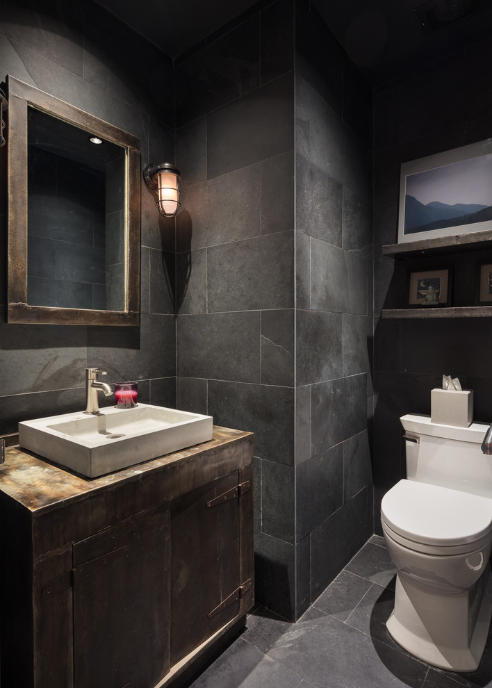Inspiration for an industrial powder room remodel in New York