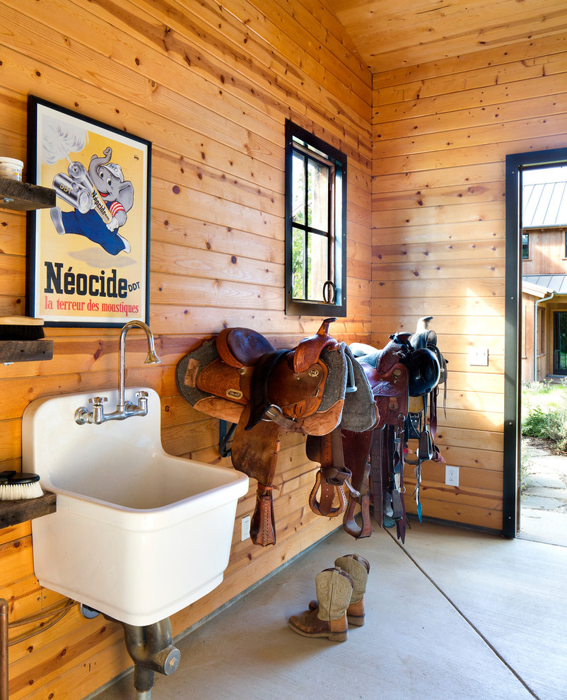 This is an example of a rustic cloakroom in San Francisco with a wall-mounted sink.