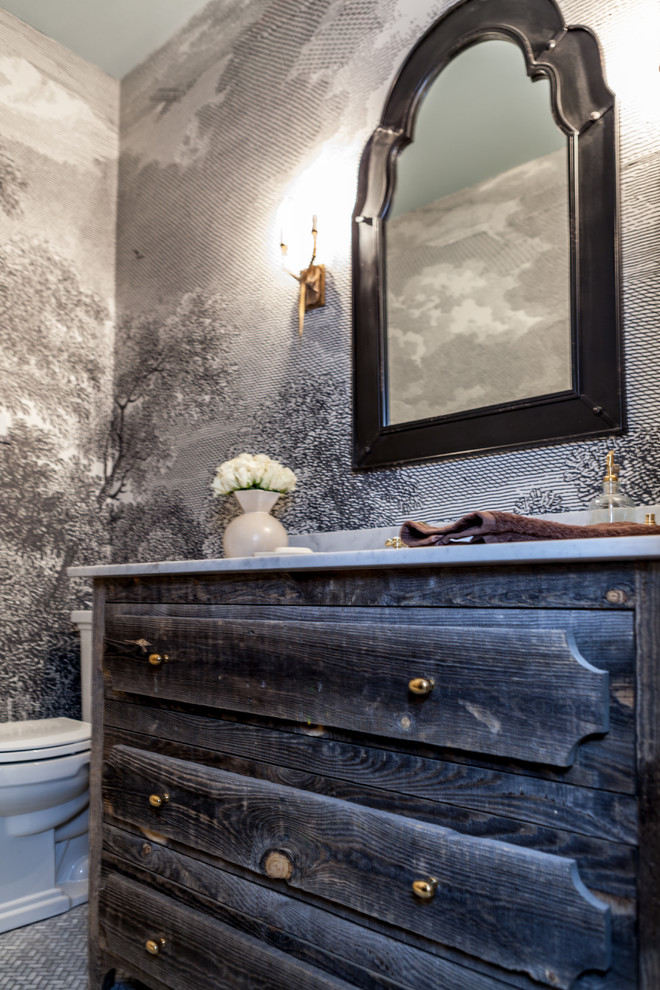 Example of a classic powder room design in Dallas with furniture-like cabinets, distressed cabinets, a two-piece toilet, multicolored walls and an undermount sink