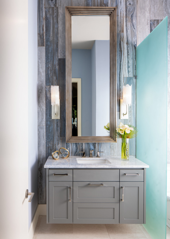 Design ideas for a traditional cloakroom in Los Angeles with shaker cabinets, grey cabinets, multi-coloured tiles, a submerged sink, beige floors and white worktops.