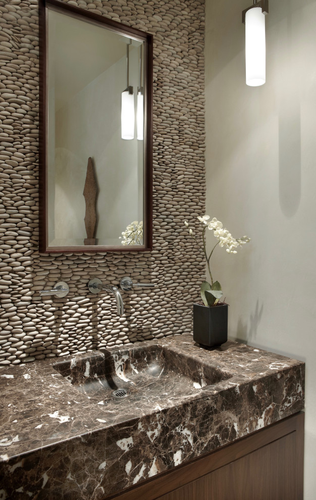 Design ideas for a contemporary cloakroom in Chicago with flat-panel cabinets, medium wood cabinets, beige tiles, mosaic tiles, beige walls, an integrated sink, marble worktops, brown worktops and a built in vanity unit.