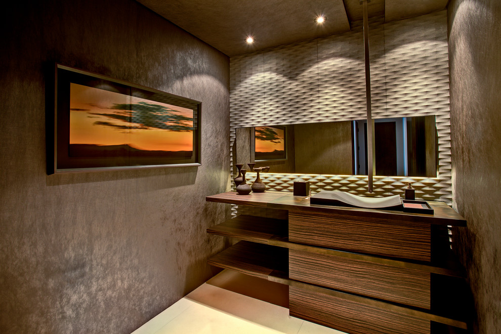 Diseño de aseo contemporáneo pequeño con lavabo sobreencimera y paredes grises