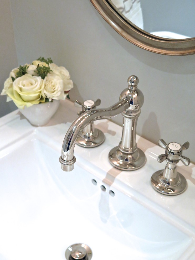 Powder room - small victorian powder room idea in Montreal with a pedestal sink and gray walls