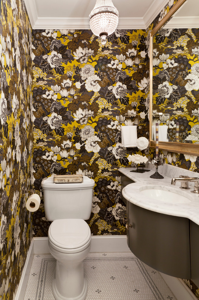 Inspiration for a small timeless mosaic tile floor and multicolored floor powder room remodel in Denver with brown cabinets, a two-piece toilet, an undermount sink, white countertops and multicolored walls