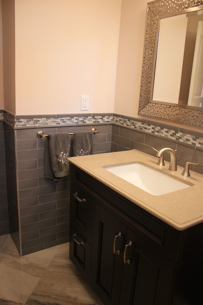 Warm Beige and gray bathroom in Teaneck, NJ Contemporary Powder