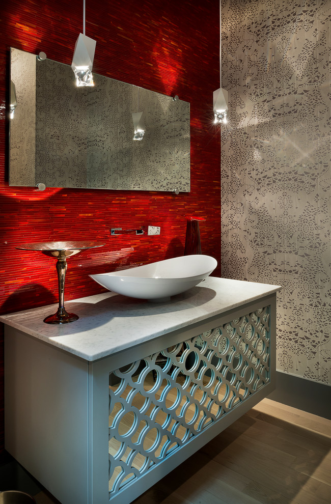 This is an example of a contemporary cloakroom in Denver with a vessel sink, freestanding cabinets and red walls.