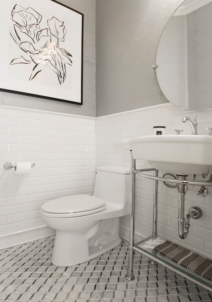 Inspiration for a small traditional cloakroom in Dallas with open cabinets, a one-piece toilet, white tiles, metro tiles, white walls, marble flooring, a pedestal sink, grey floors and white worktops.