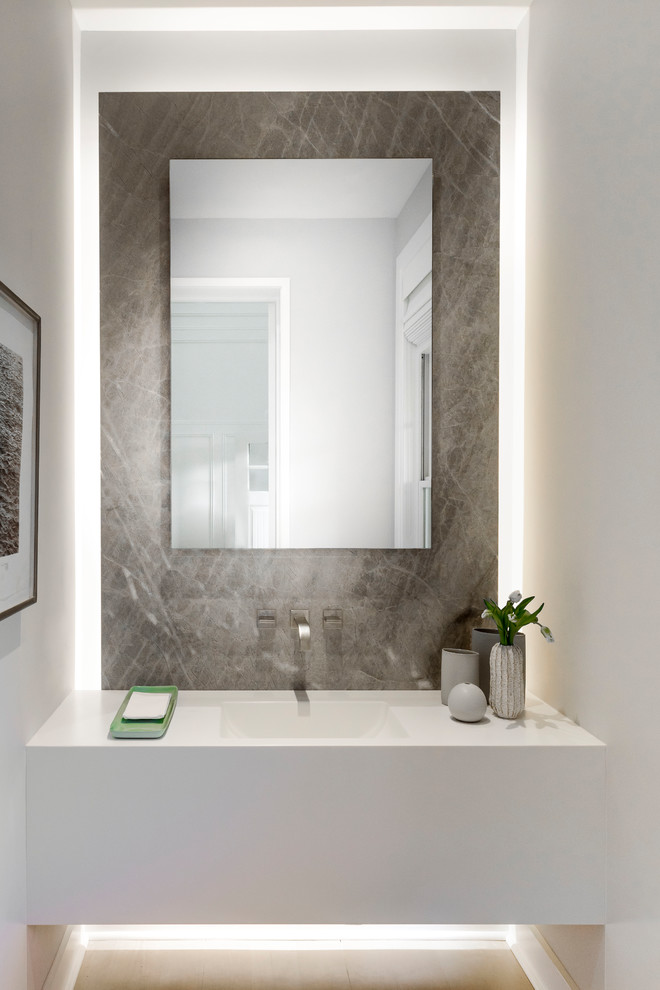 Inspiration for a contemporary powder room remodel in New York