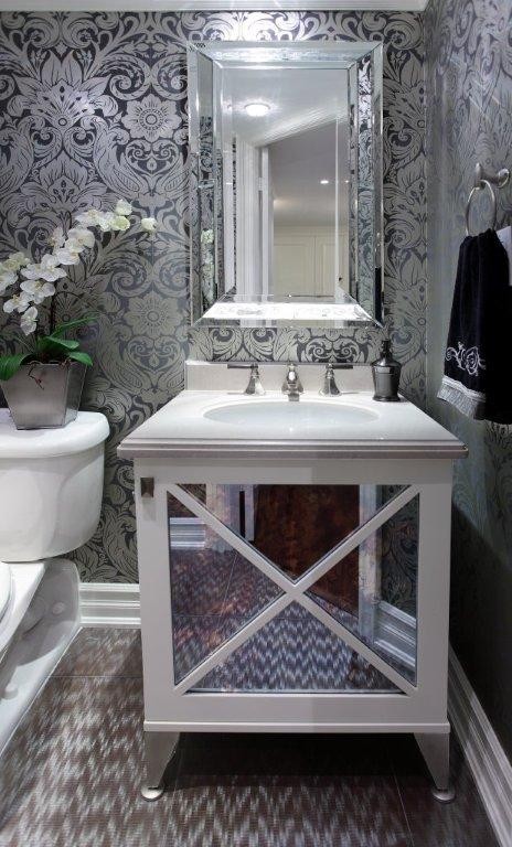 Example of a trendy powder room design in Toronto