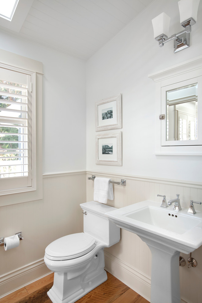 Powder room - traditional powder room idea in Vancouver with a pedestal sink