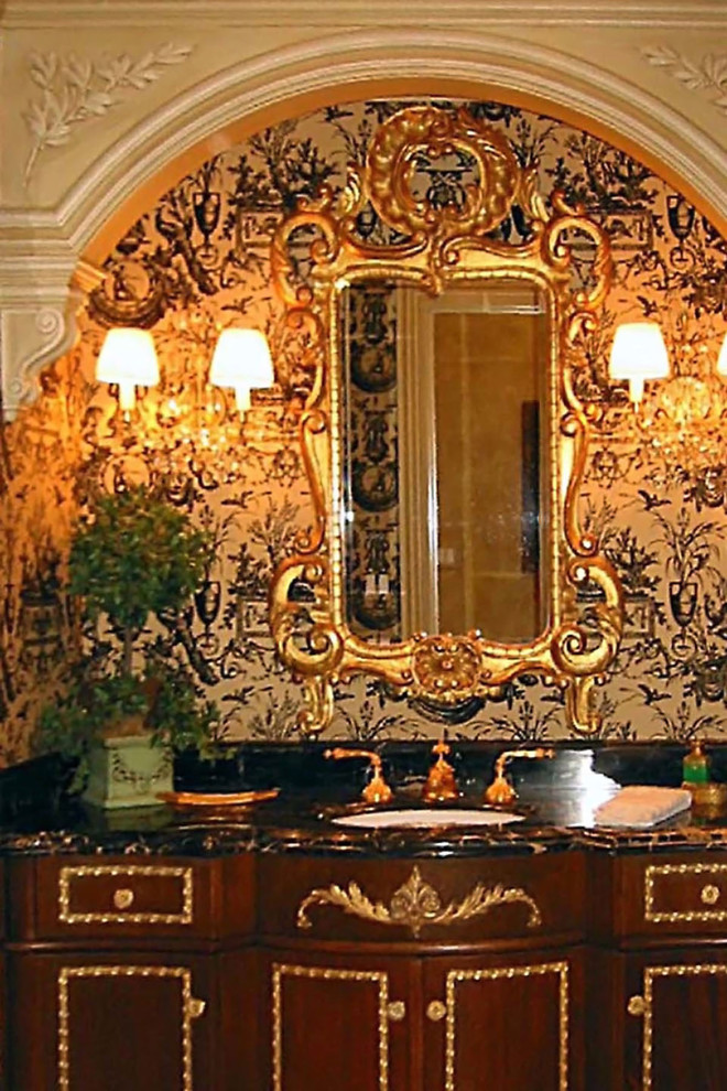 Large elegant powder room photo in Boston with furniture-like cabinets, medium tone wood cabinets, marble countertops and an undermount sink