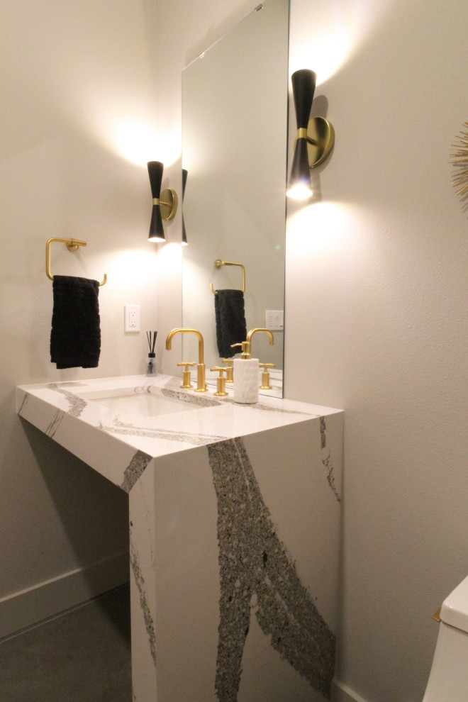 Mid-sized 1960s concrete floor, gray floor and vaulted ceiling powder room photo in Seattle with open cabinets, a one-piece toilet, gray walls, an undermount sink, quartz countertops, multicolored countertops and a floating vanity