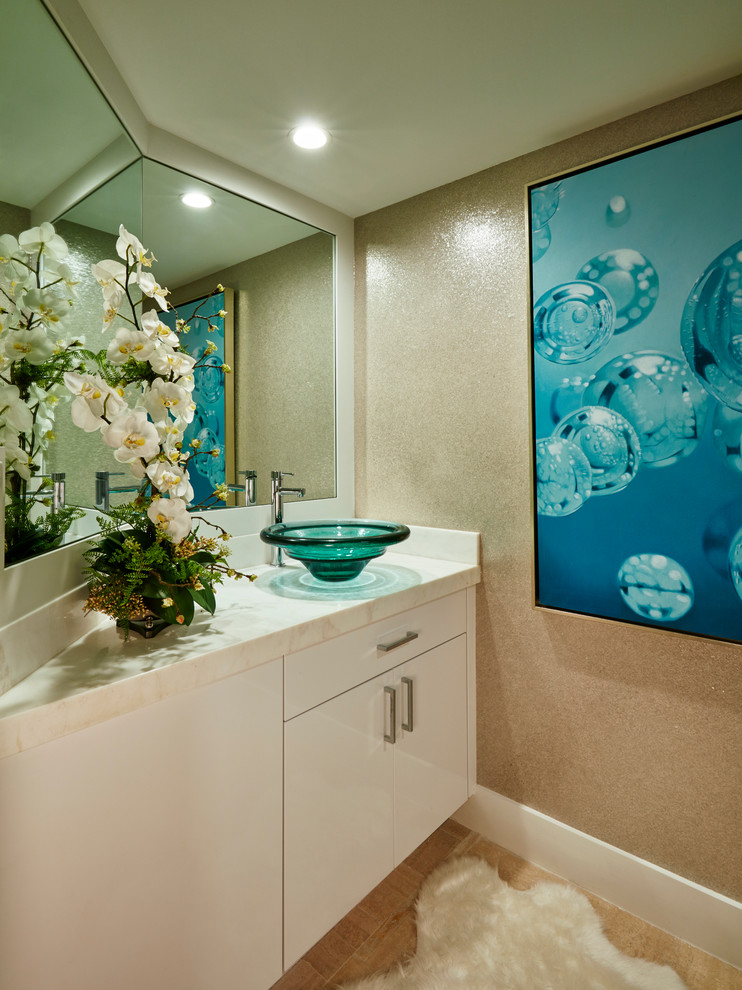 Example of a transitional travertine floor powder room design in Miami with flat-panel cabinets, white cabinets, a vessel sink and quartz countertops