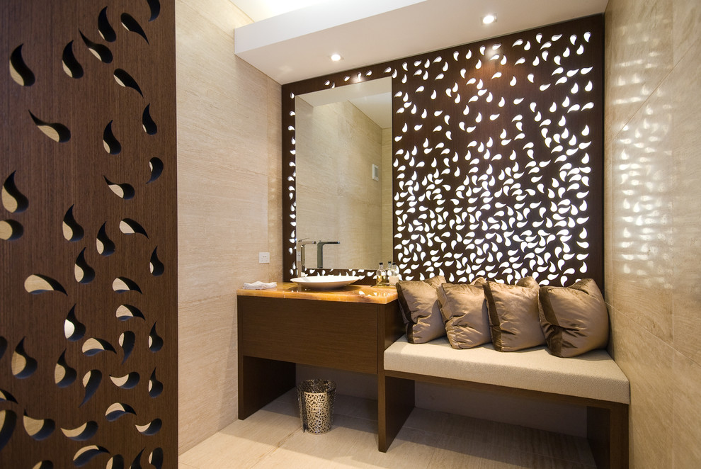 This is an example of a contemporary cloakroom in Brisbane with a vessel sink.