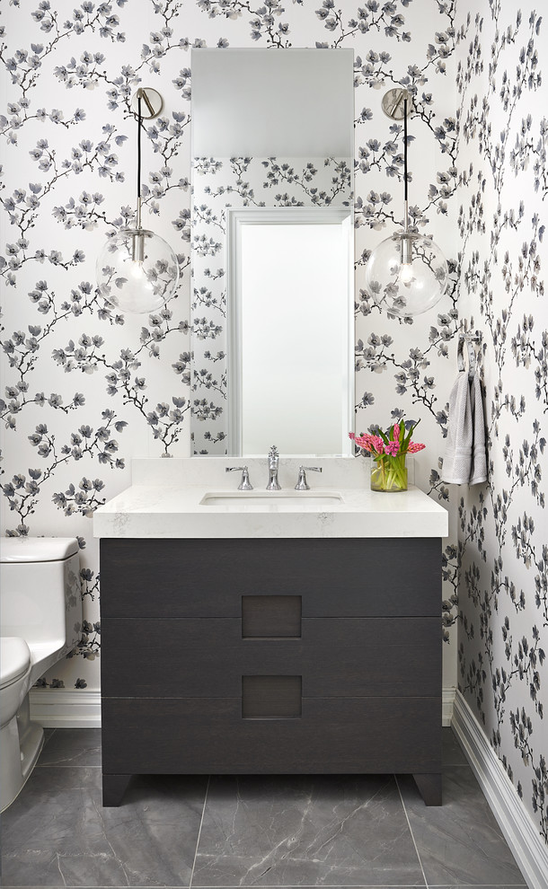 Design ideas for a medium sized classic cloakroom in Toronto with freestanding cabinets, multi-coloured walls, a submerged sink, grey floors, white worktops, grey cabinets, ceramic flooring and marble worktops.