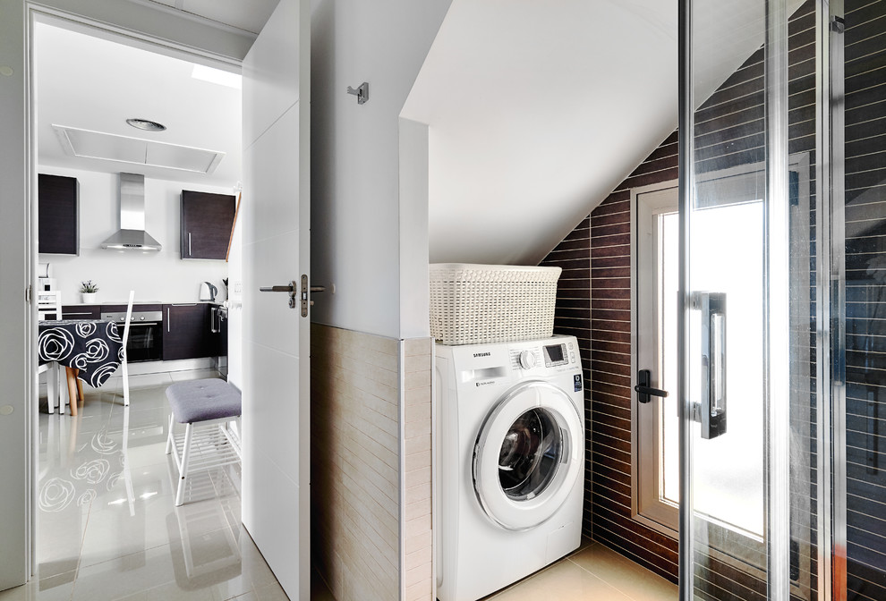 Dedicated laundry room - small contemporary dedicated laundry room idea in Other