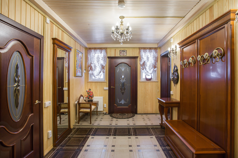 Photo of a medium sized bohemian front door in Saint Petersburg with beige walls, porcelain flooring, a single front door, a glass front door and multi-coloured floors.
