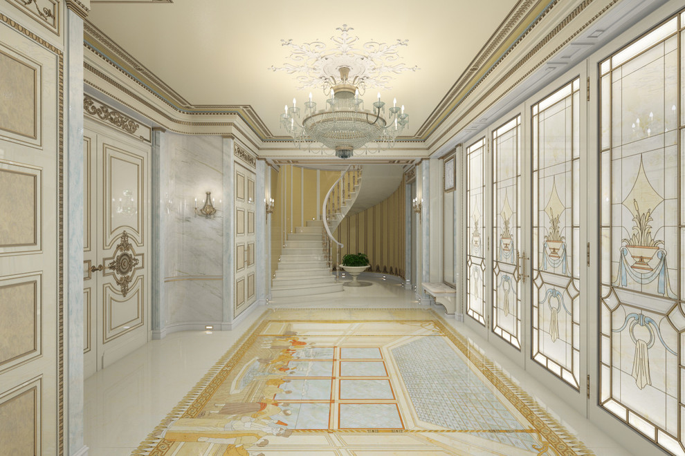 他の地域にあるラグジュアリーな広いトラディショナルスタイルのおしゃれな玄関ホール (ベージュの壁、大理石の床、白いドア) の写真