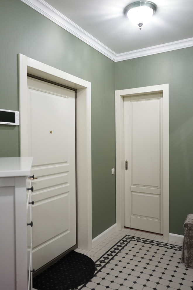 Источник вдохновения для домашнего уюта: входная дверь в современном стиле с одностворчатой входной дверью и белой входной дверью