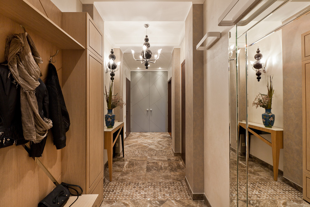 Photo of a medium sized contemporary hallway in Saint Petersburg with beige walls, porcelain flooring, a double front door and brown floors.