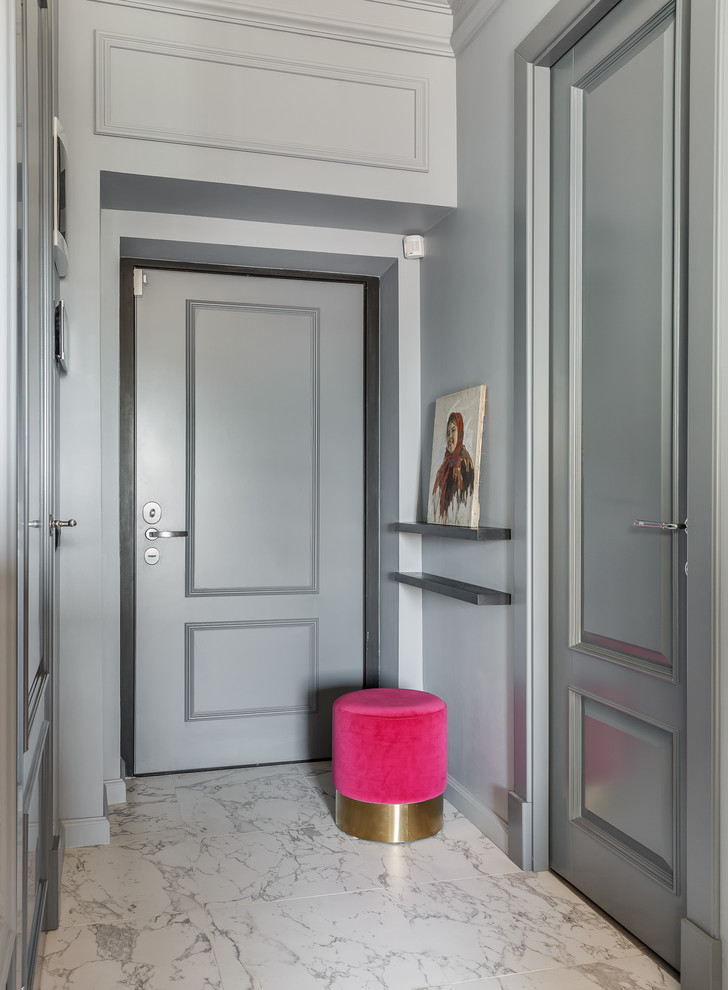 Traditional hallway in Moscow with grey walls, a single front door, a grey front door and white floors.