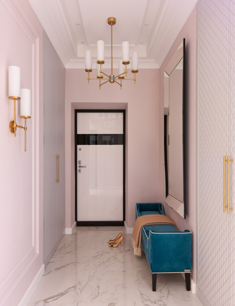 На фото: входная дверь среднего размера в стиле неоклассика (современная классика) с полом из керамогранита, бежевым полом, розовыми стенами, одностворчатой входной дверью, белой входной дверью и многоуровневым потолком