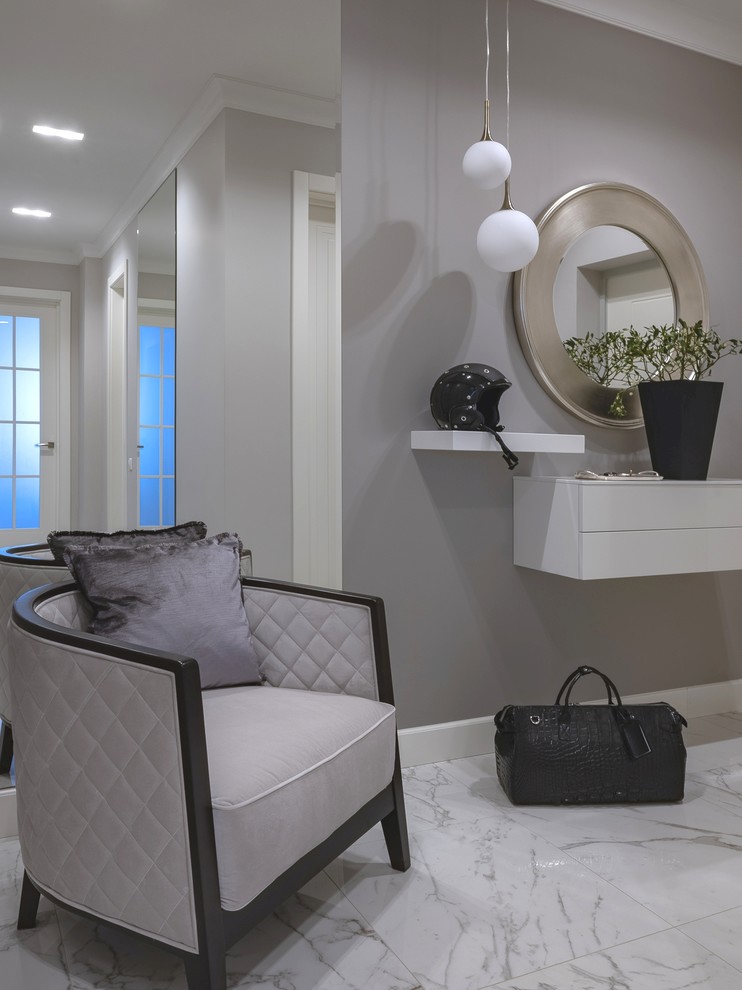 Inspiration for a mid-sized transitional porcelain tile and white floor entry hall remodel in Moscow