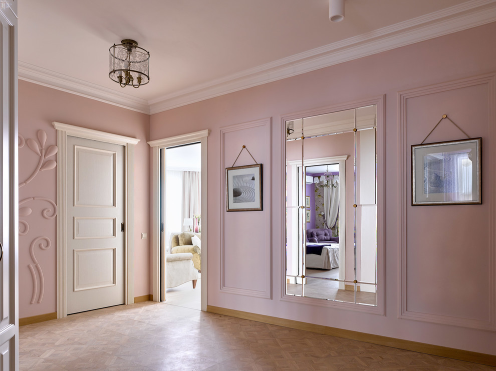 Inspiration for a classic entrance in Other with pink walls.