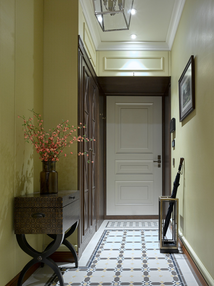 Inspiration for a traditional front door in Moscow with ceramic flooring, green walls, a single front door and a white front door.