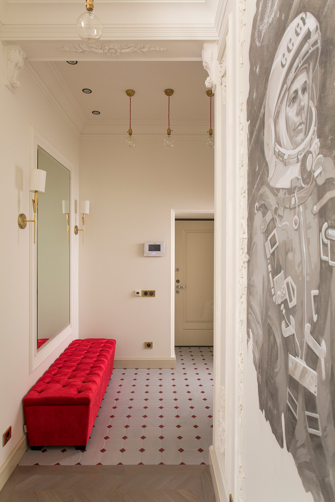 Ejemplo de hall ecléctico con suelo de baldosas de cerámica, puerta blanca y paredes blancas
