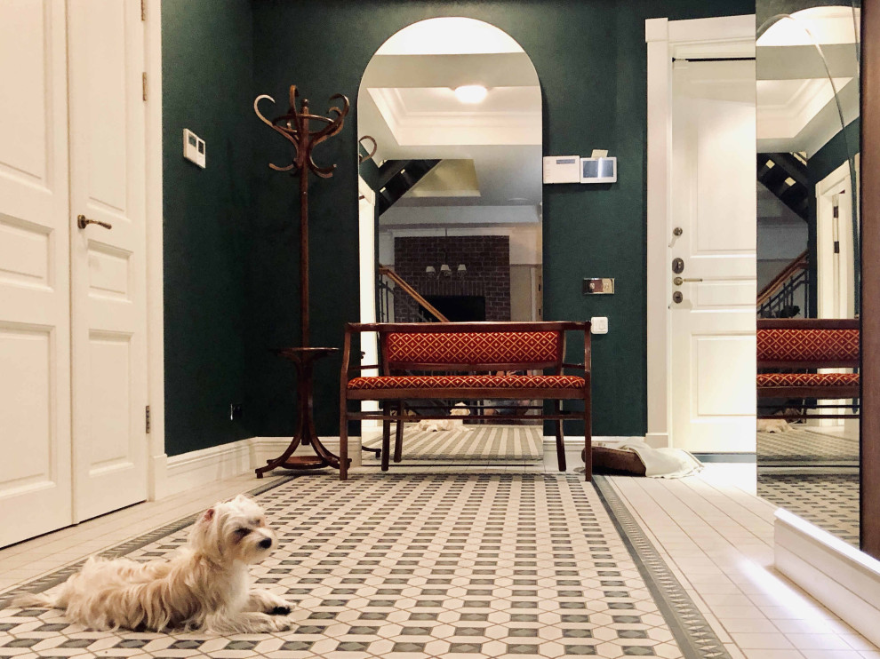 Inspiration for a large traditional hallway in Moscow with green walls, ceramic flooring, a single front door, a white front door and multi-coloured floors.