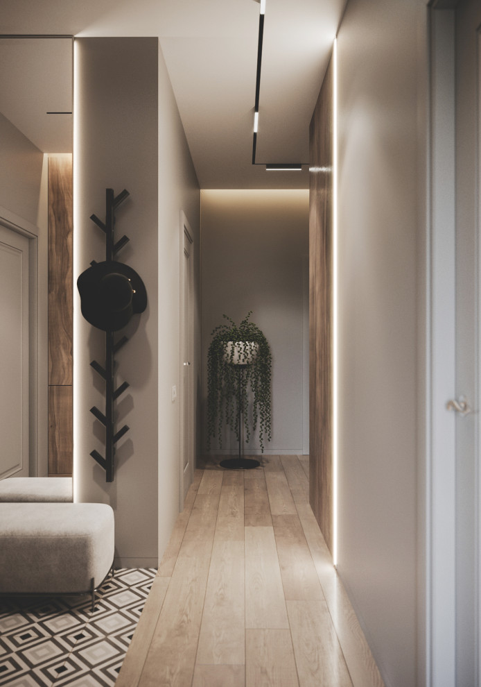 Kleine Moderne Haustür mit grauer Wandfarbe, Keramikboden, grauer Haustür und buntem Boden in Valencia